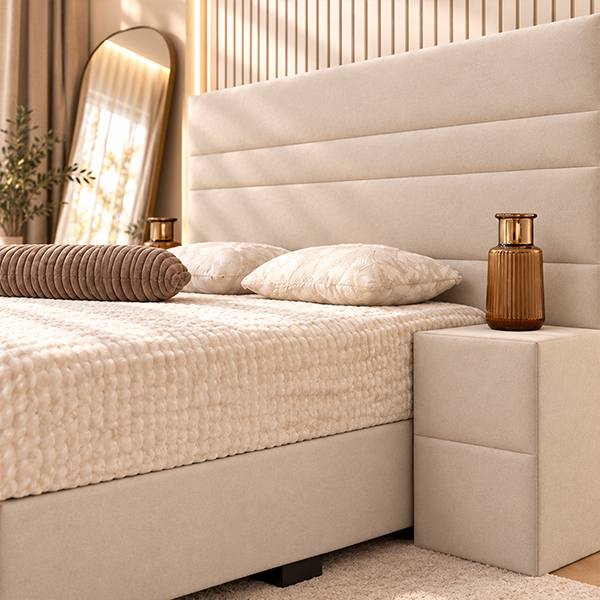 Boxspring Set Bella in een lichte uitvoering, met een detail van het hoofdbord en het nachtkastje
